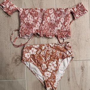 Cute 2 piece bikini. Bottom is high rise.
